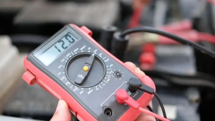 Check voltmeter to read battery gauge