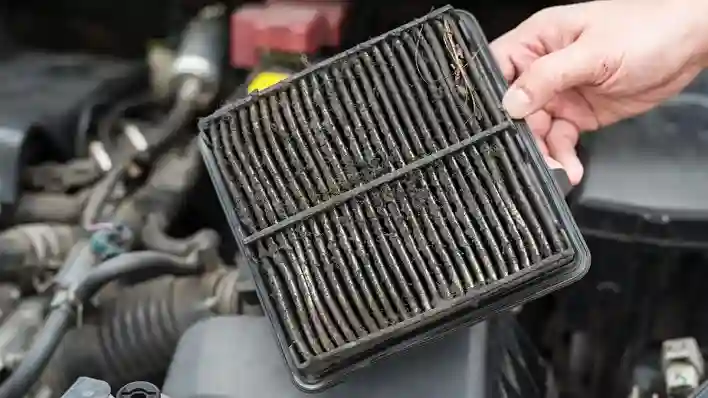 Clog air filter to disable a car