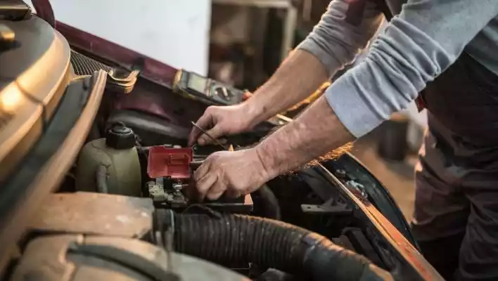 how to fix a car battery that keeps dying