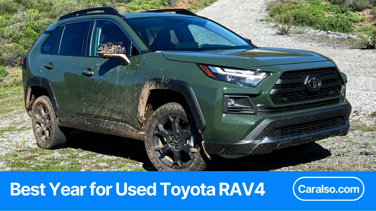 Row of used Toyota RAV4 SUVs from different model years parked in a lot