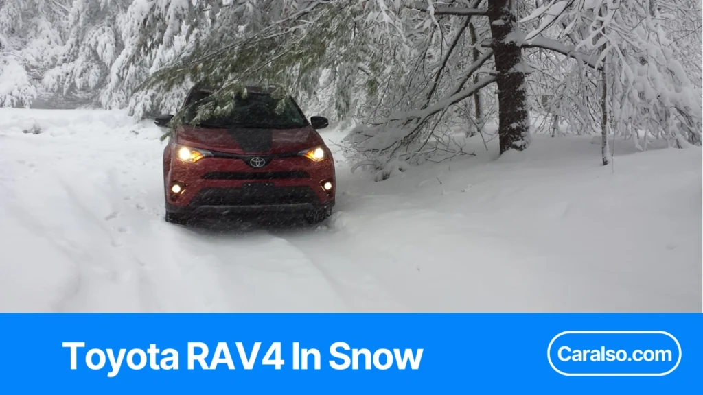 A Toyota RAV4 in snow with a quick AWD and winter tire checklist plus a stopping-distance comparison for safer winter driving.